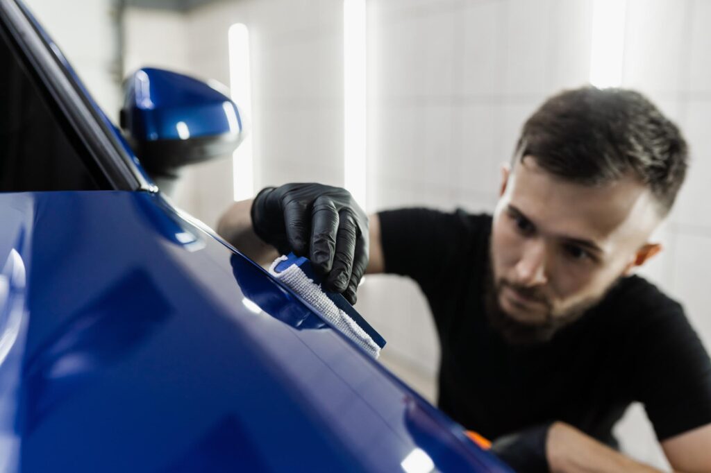 applying ceramic protective coat on car body