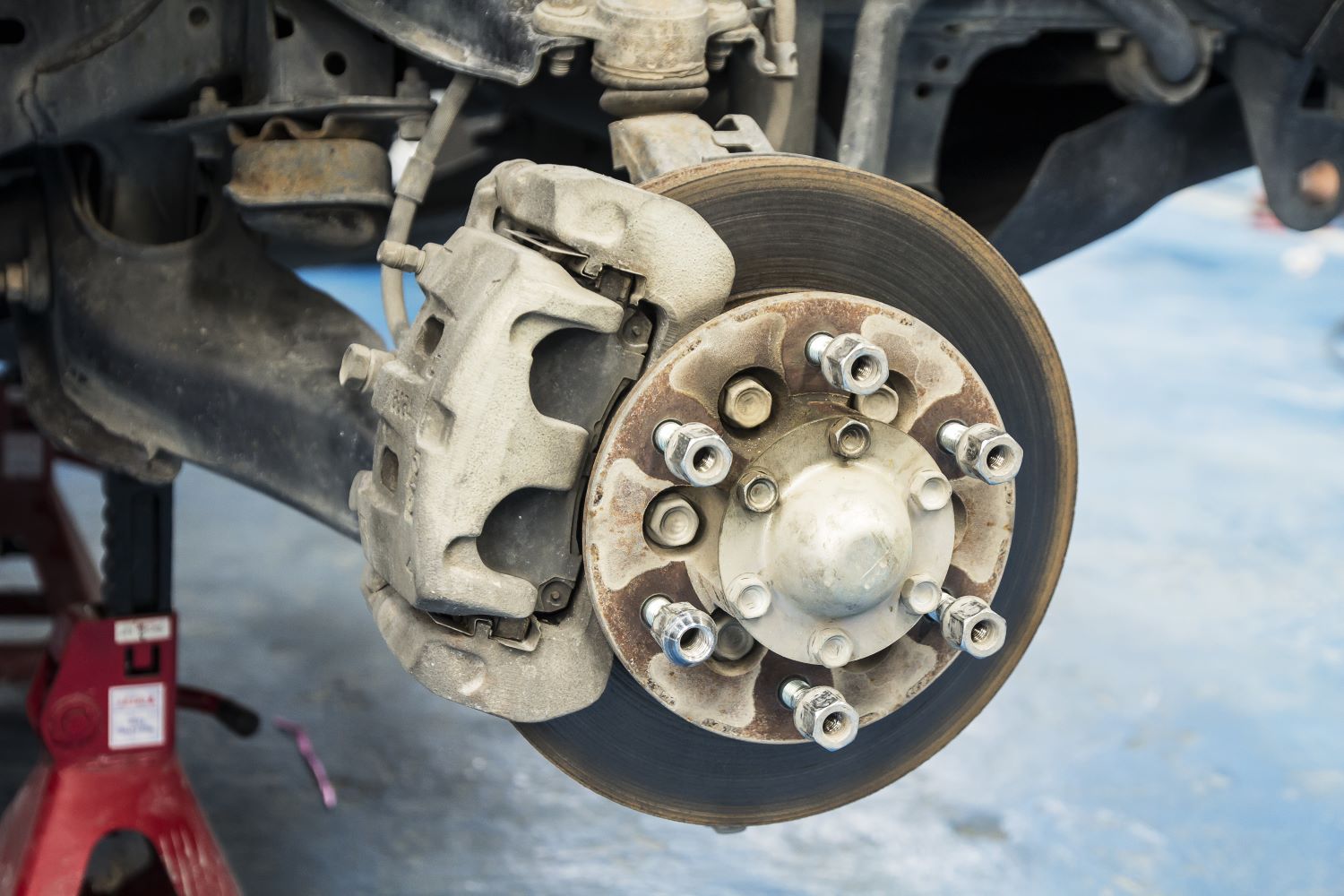 Leaking Brake Fluid Causes and Dangers In The Garage with