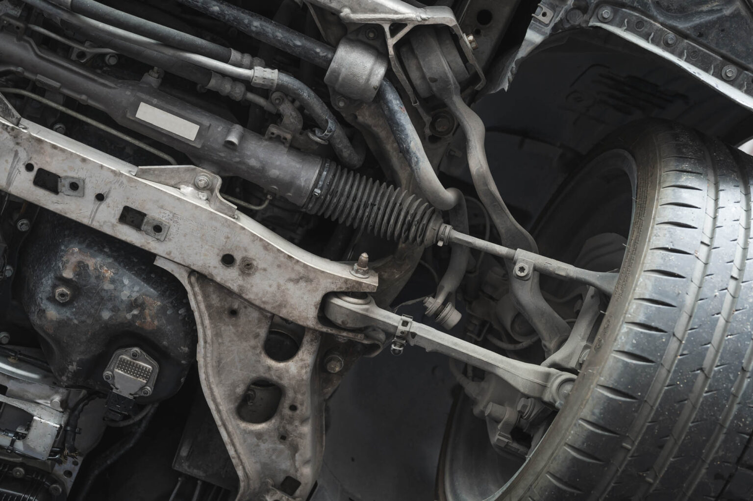 Is There a Rattling Noise Under Your Car When Going Over Bumps? This