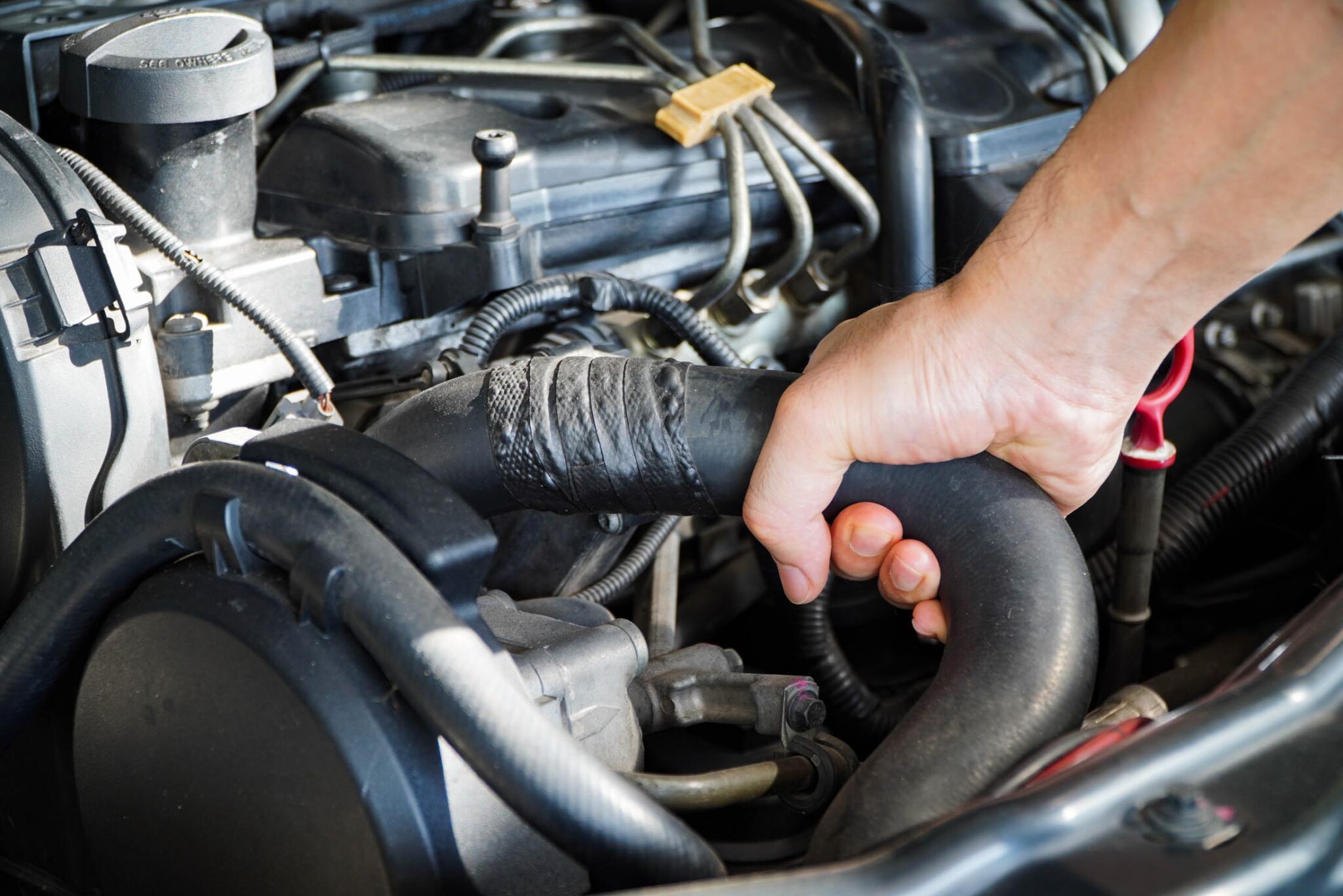 The Dangers of Driving With a Collapsed Radiator Hose In The Garage