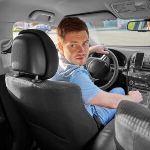 driver performing a reverse parking move