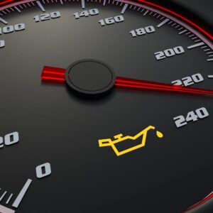 illuminated oil light on a speedometer