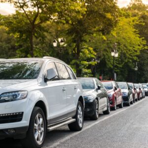 line of cars parked on a street