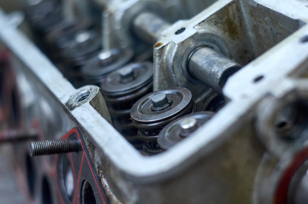 partially disassembled car cylinder head