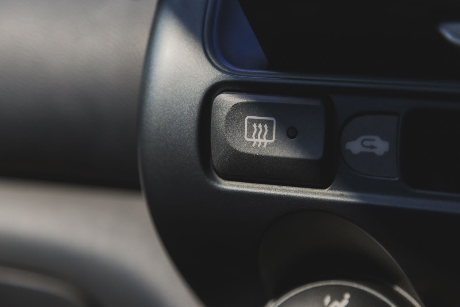 Symptoms of a Bad Rear Window Defogger Switch In The Garage with