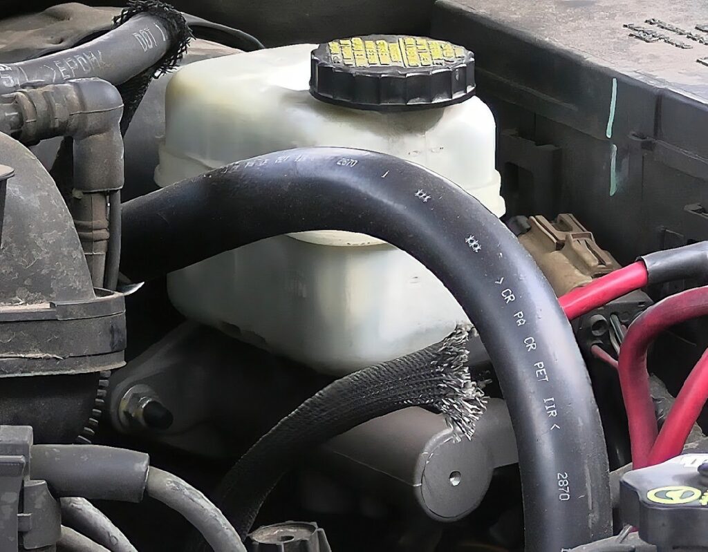 close up of brake master cylinder and fluid reservoir