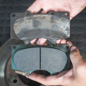 old and new brake pads