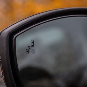 side mirror with a blind detection system