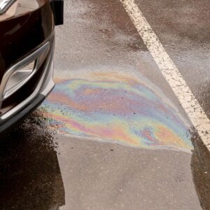 gas spill beside a car