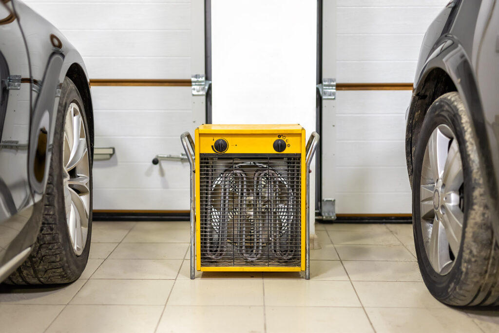 electric fan heater placed inside car garage