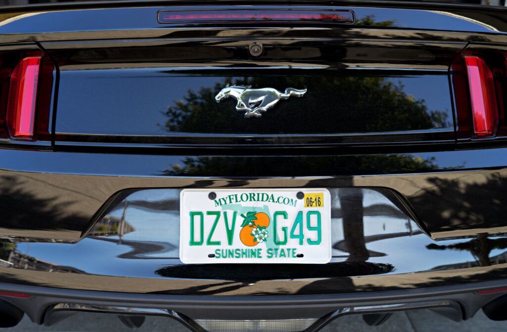 black car with a florida state plate number