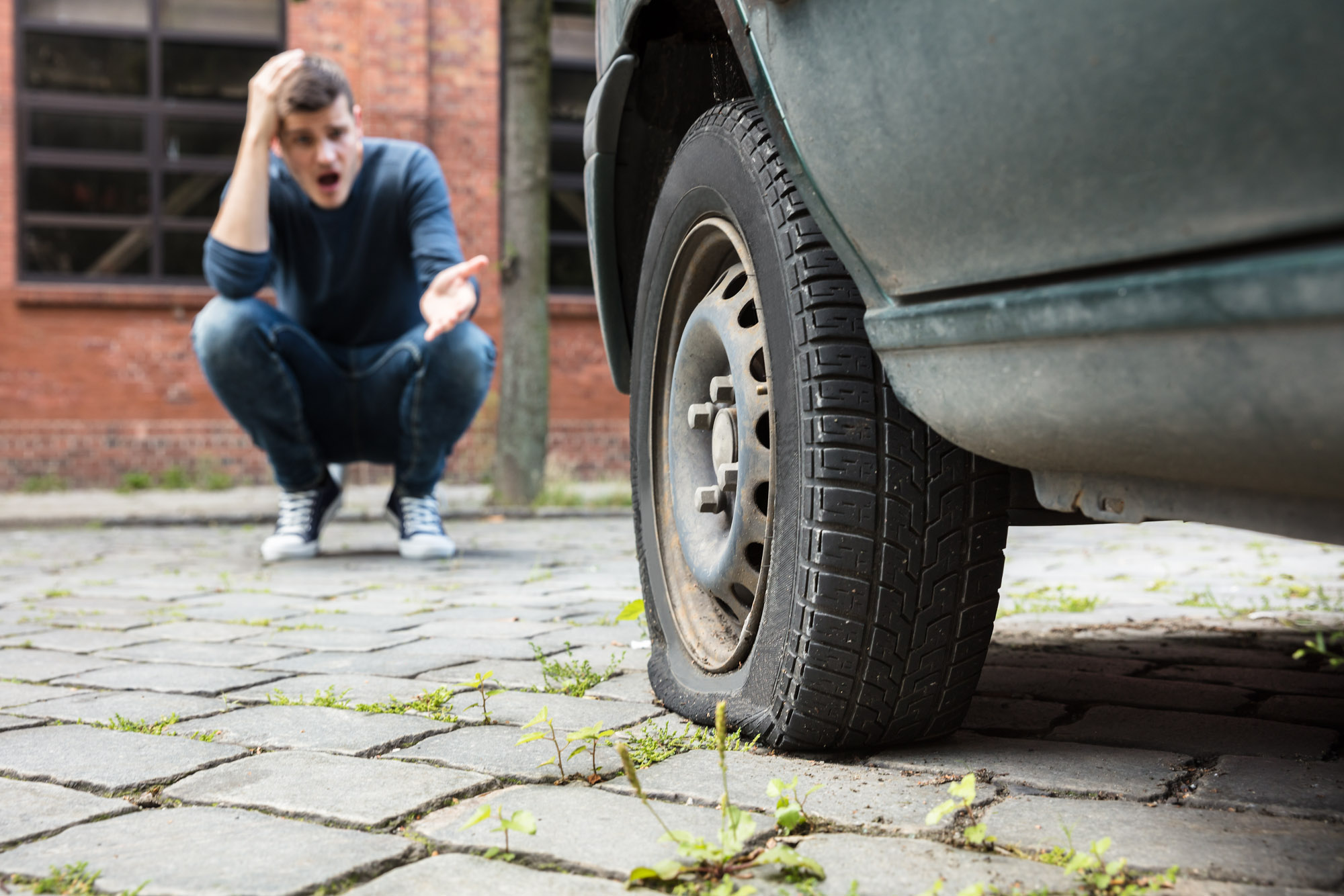 Why Does My Car Tire Keep Going Flat? In The Garage with