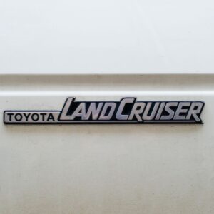 logo of an old toyota land cruiser