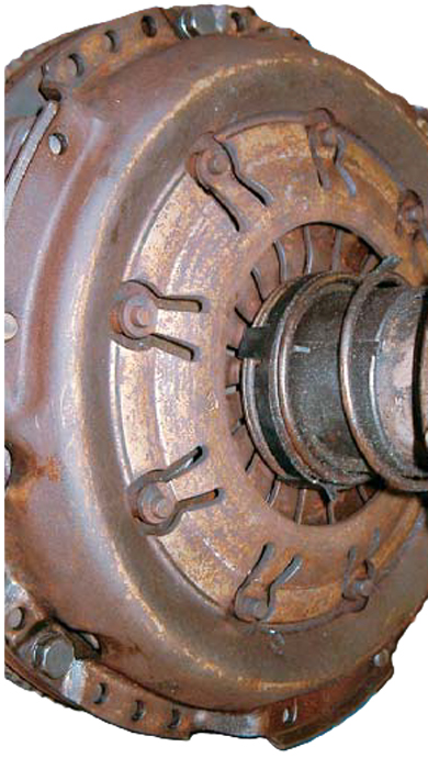 plate rotates with a flywheel bolted to the crankshaft