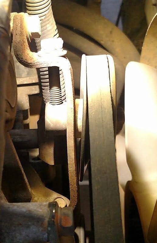 v belt will be tightened by moving the alternator