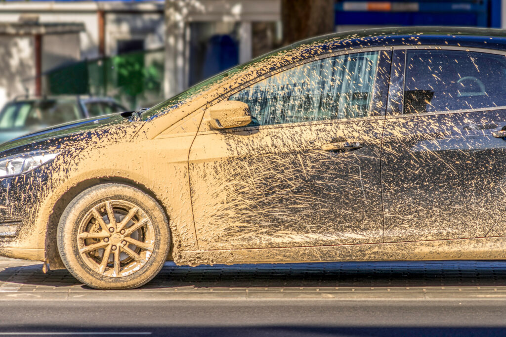 car covered in mud