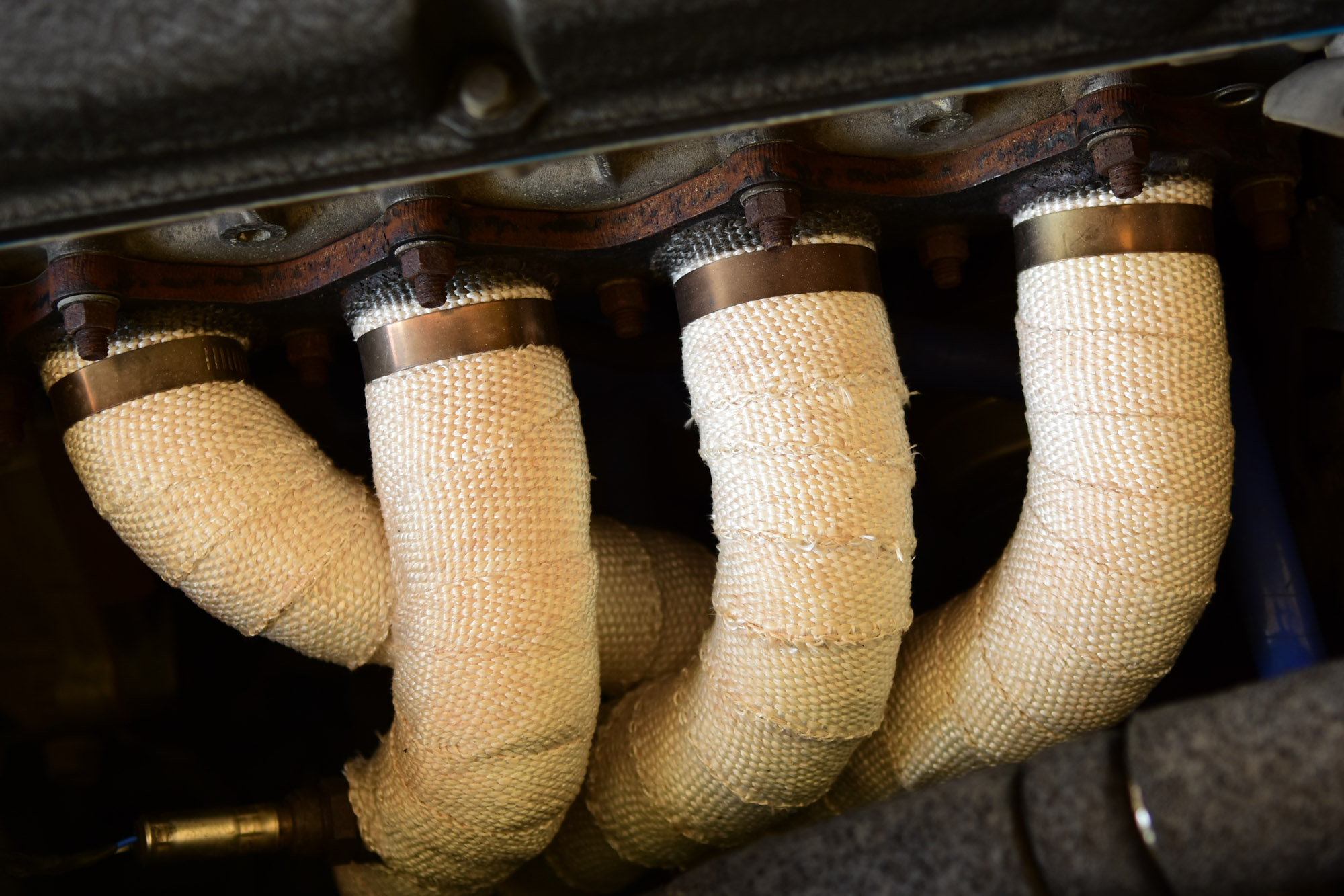 What Is an Exhaust Header Wrap? Pros, Cons, and FAQs In The Garage