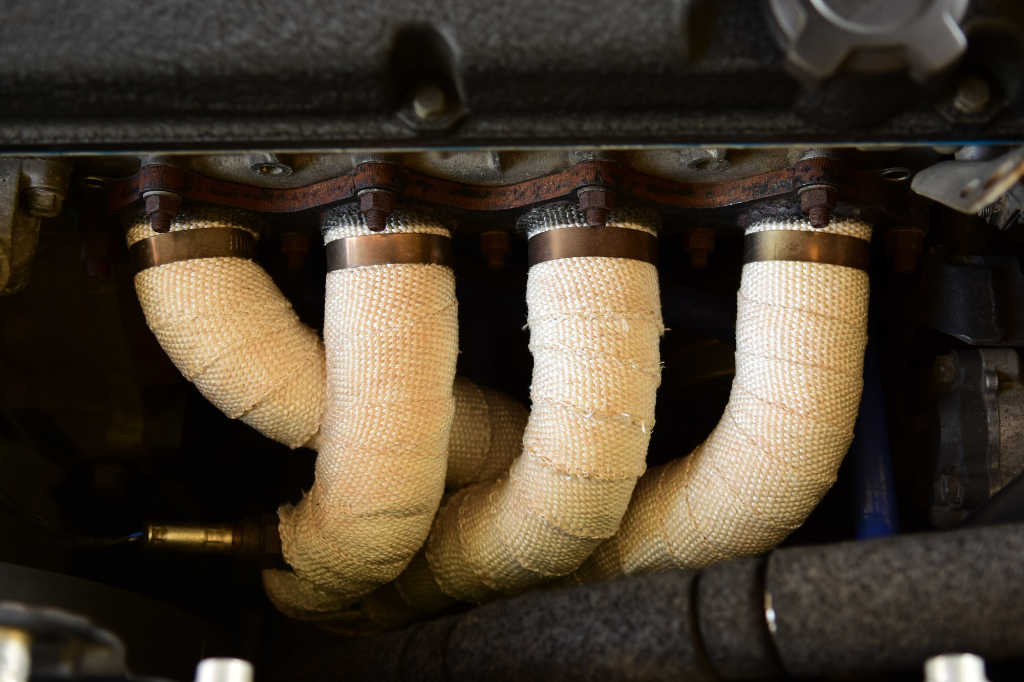 What Is an Exhaust Header Wrap? Pros, Cons, and FAQs In The Garage