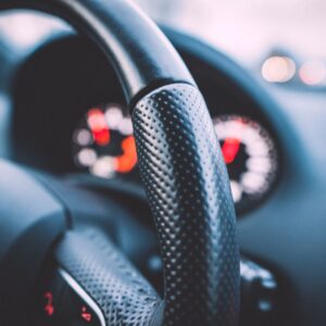 close up shot of a car steering wheel