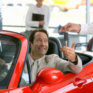 man planning to buy a used convertible