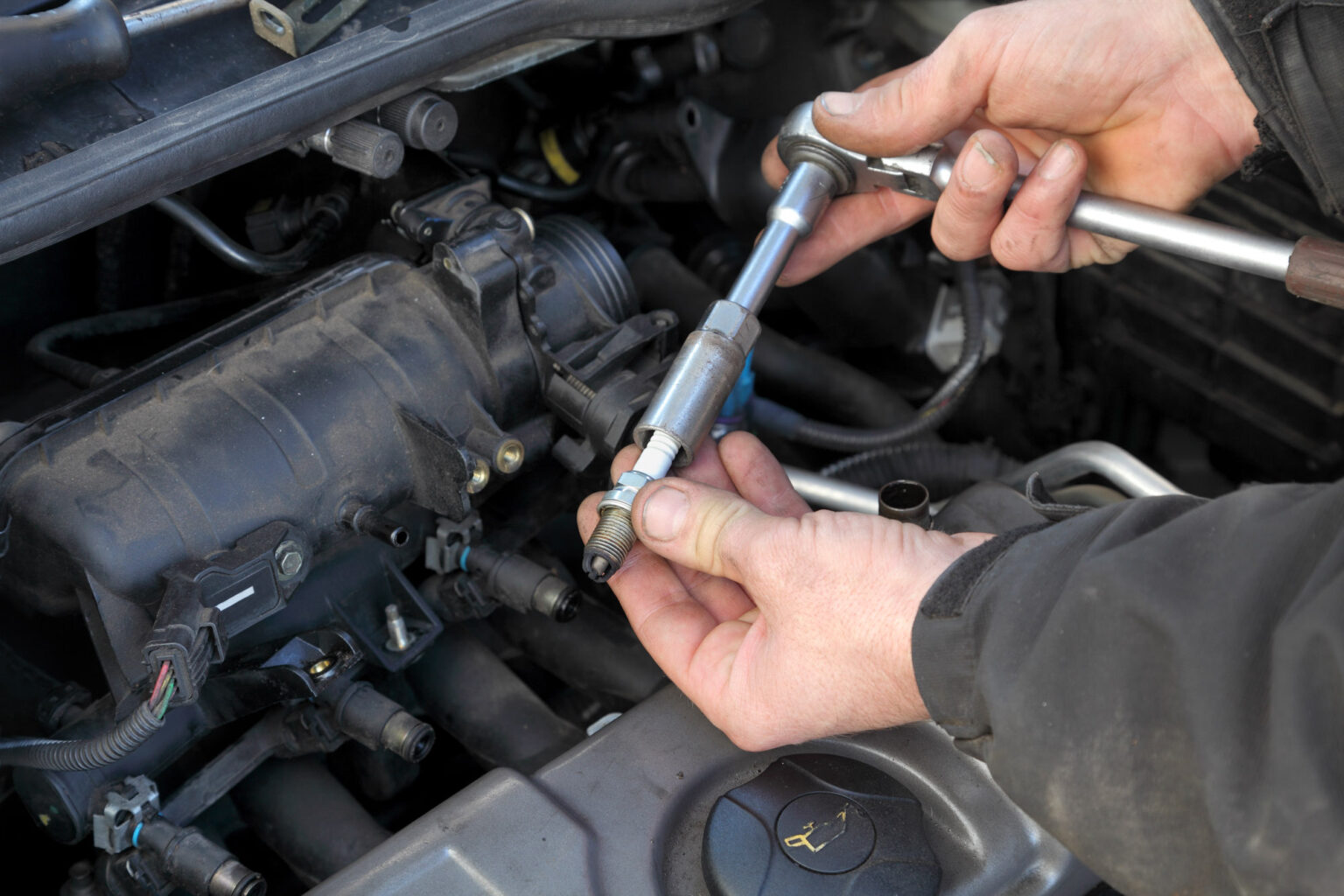 Should You Put AntiSeize Grease on Spark Plugs? In The Garage with