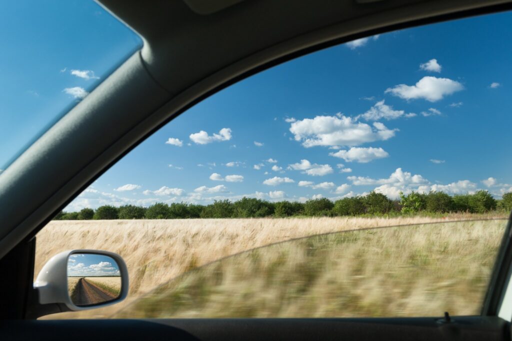 open car window causing wind buffeting