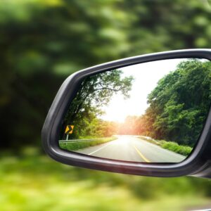 close up shot of a car side mirror