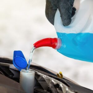 refilling the coolant reservoir with coolant