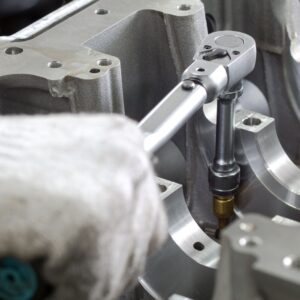 mechanic holding a torque wrench
