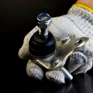 hand holding a ball joint