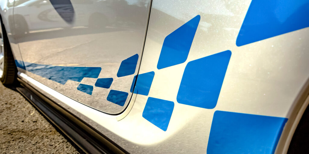 blue decals on a white car