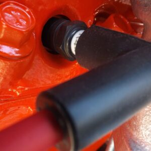 image of a spark plug and boot with wire