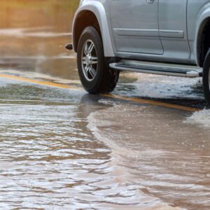 car passing through a flood