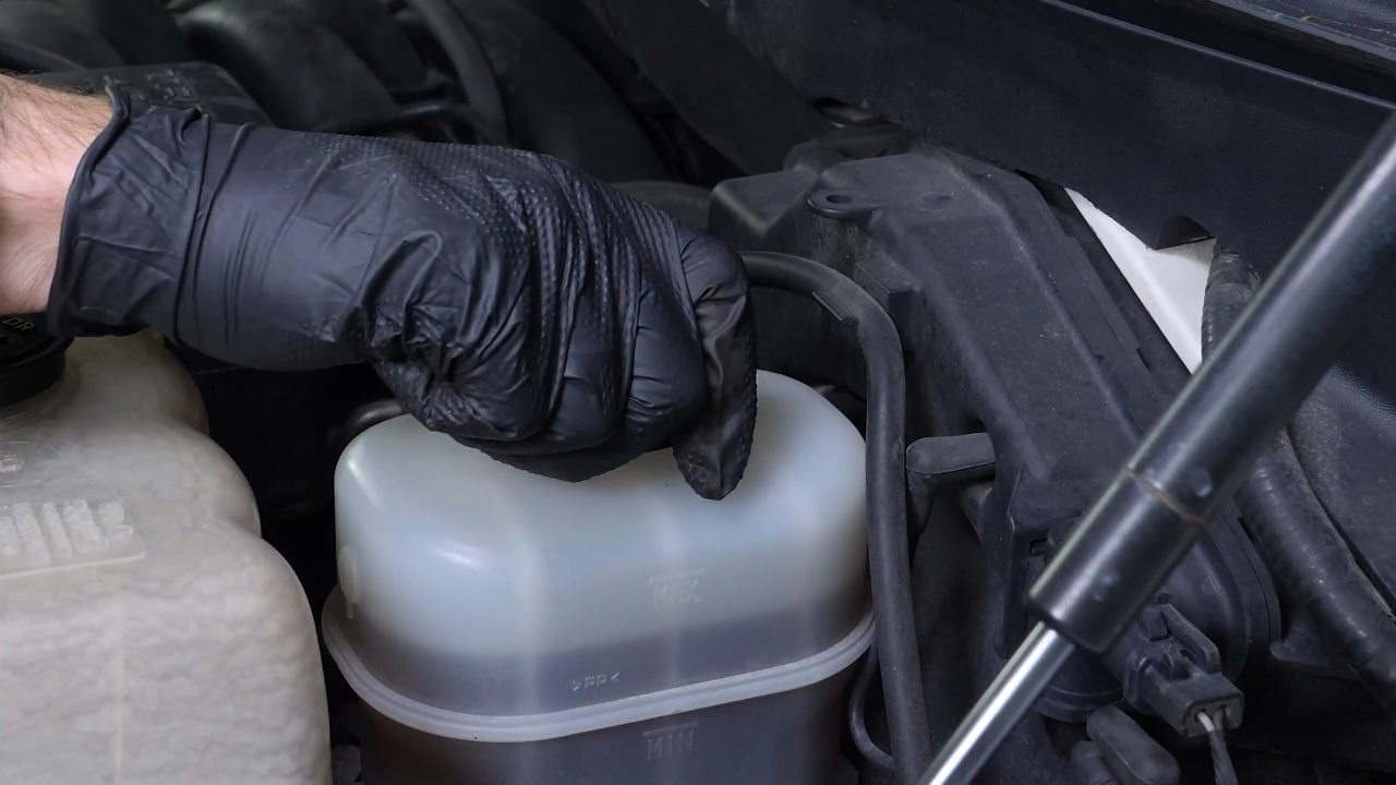 Open the brake fluid reservoir