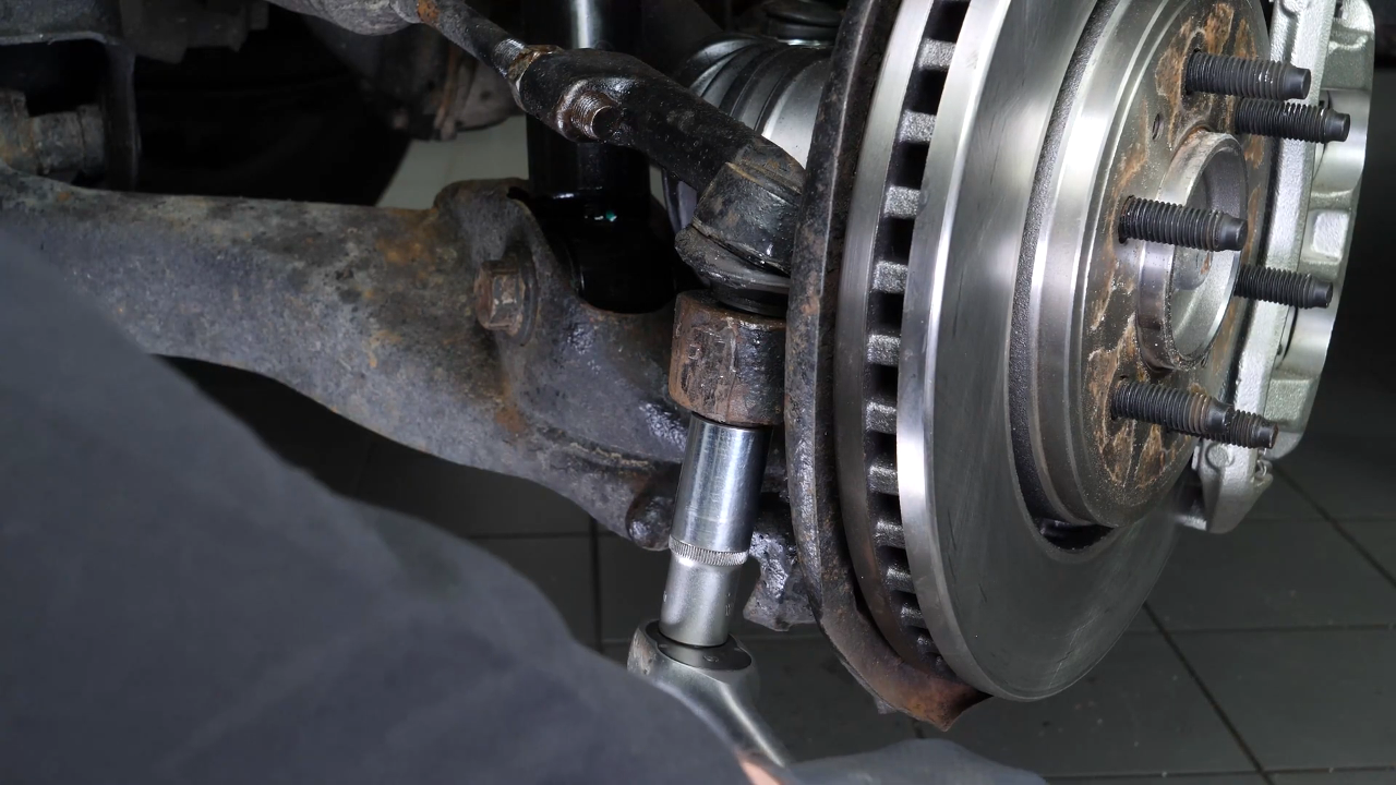 Loosen the holding nut