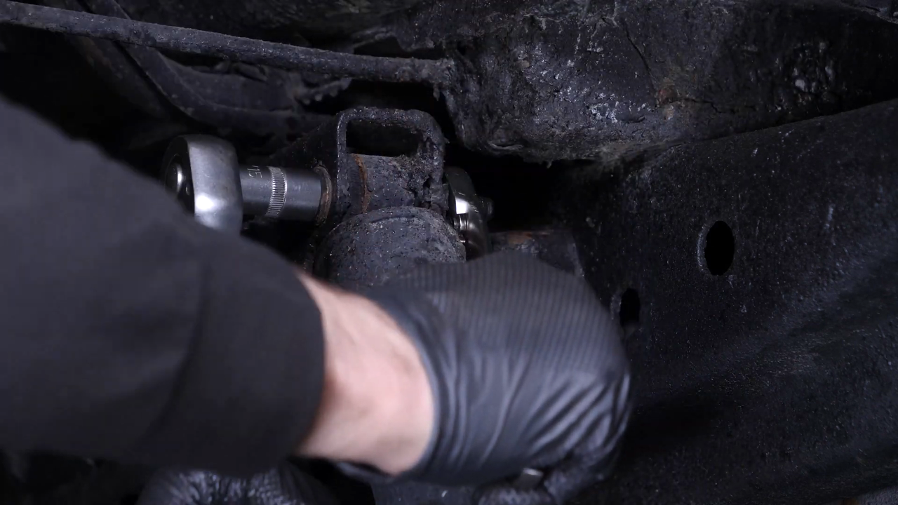 Unscrew the shock absorber heads