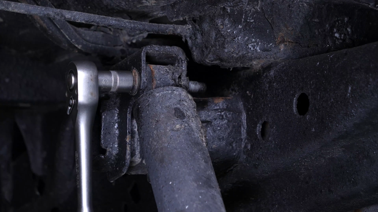 Unscrew the shock absorber heads