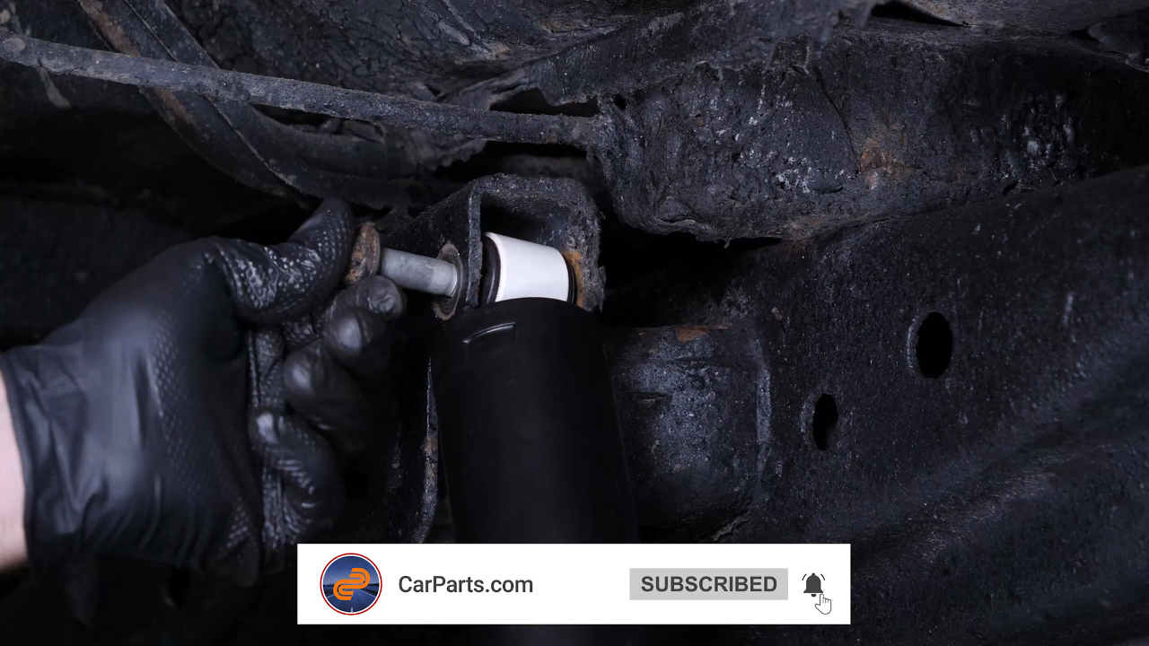 Install the new shock absorber