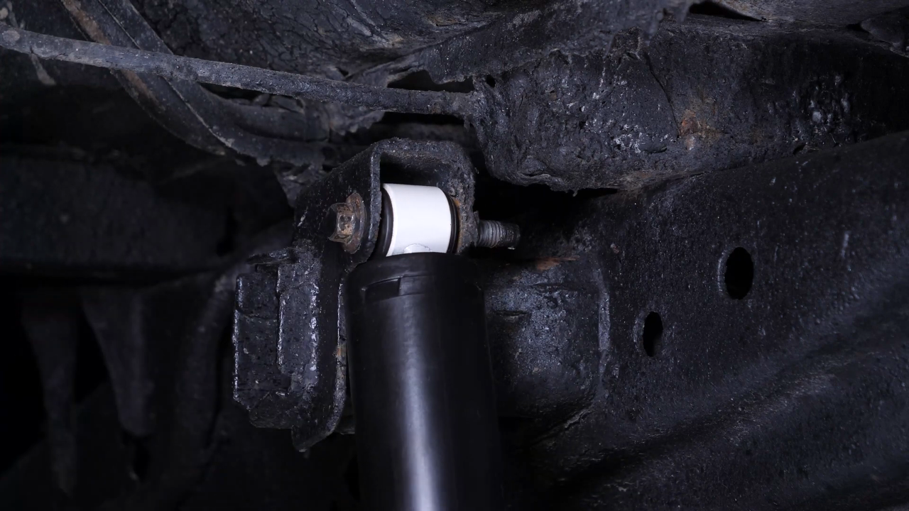 Install the new shock absorber