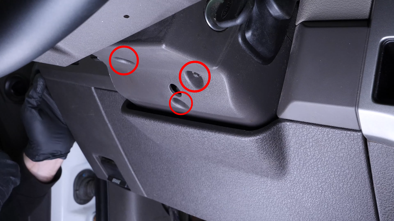 Remove the top steering column cover