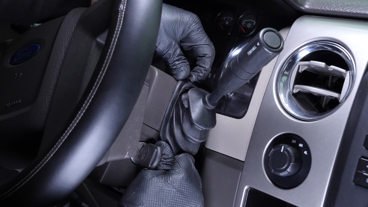 Remove the top steering column cover