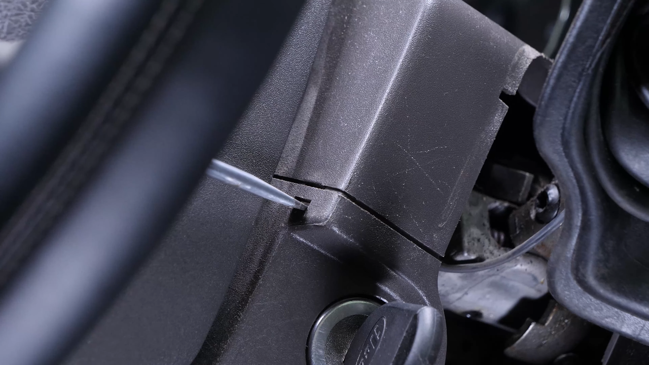 Remove the lower steering column cover