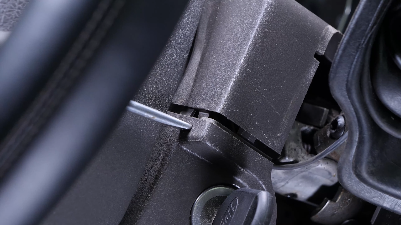 Remove the lower steering column cover
