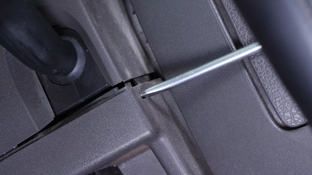 Remove the lower steering column cover