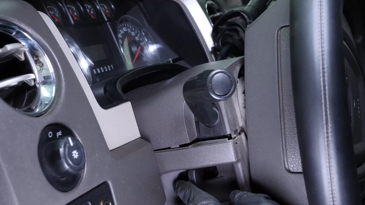 Remove the lower steering column cover