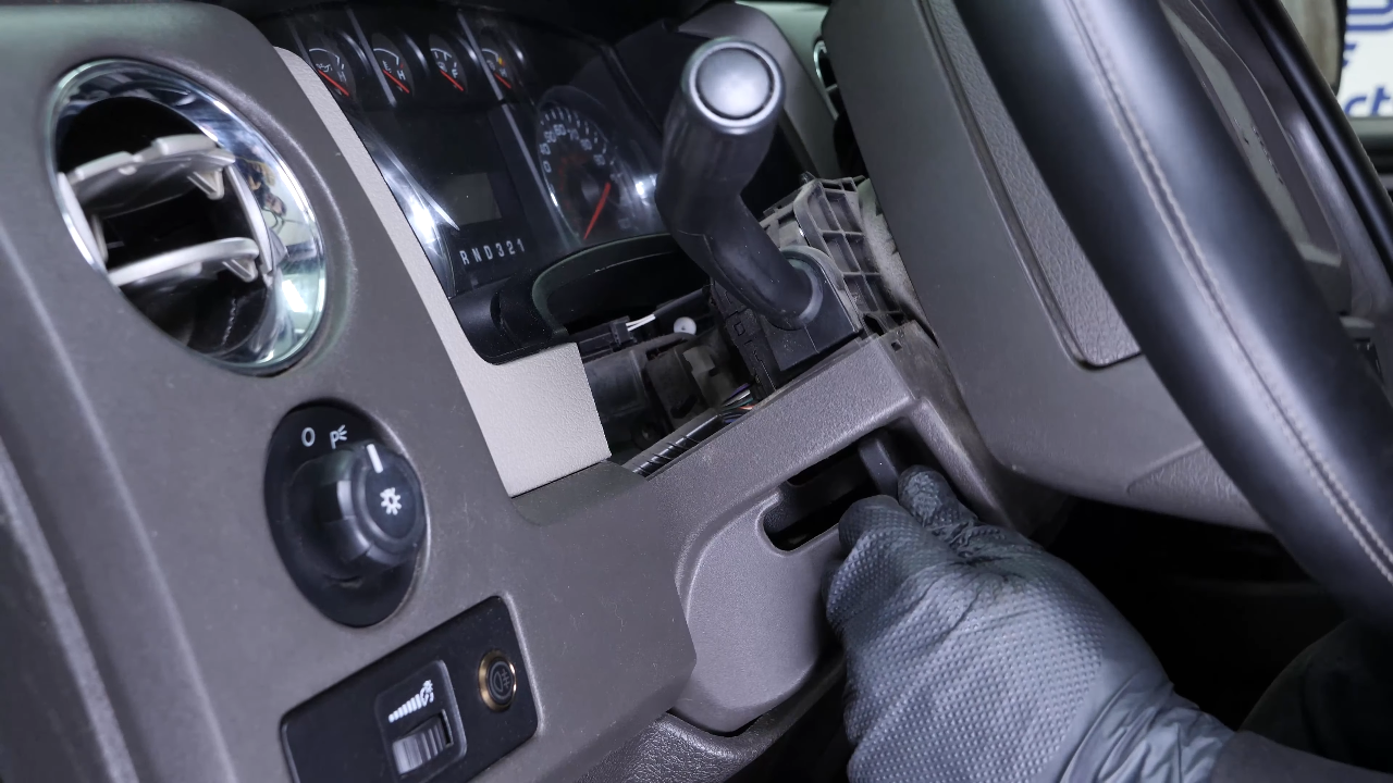 Remove the lower steering column cover