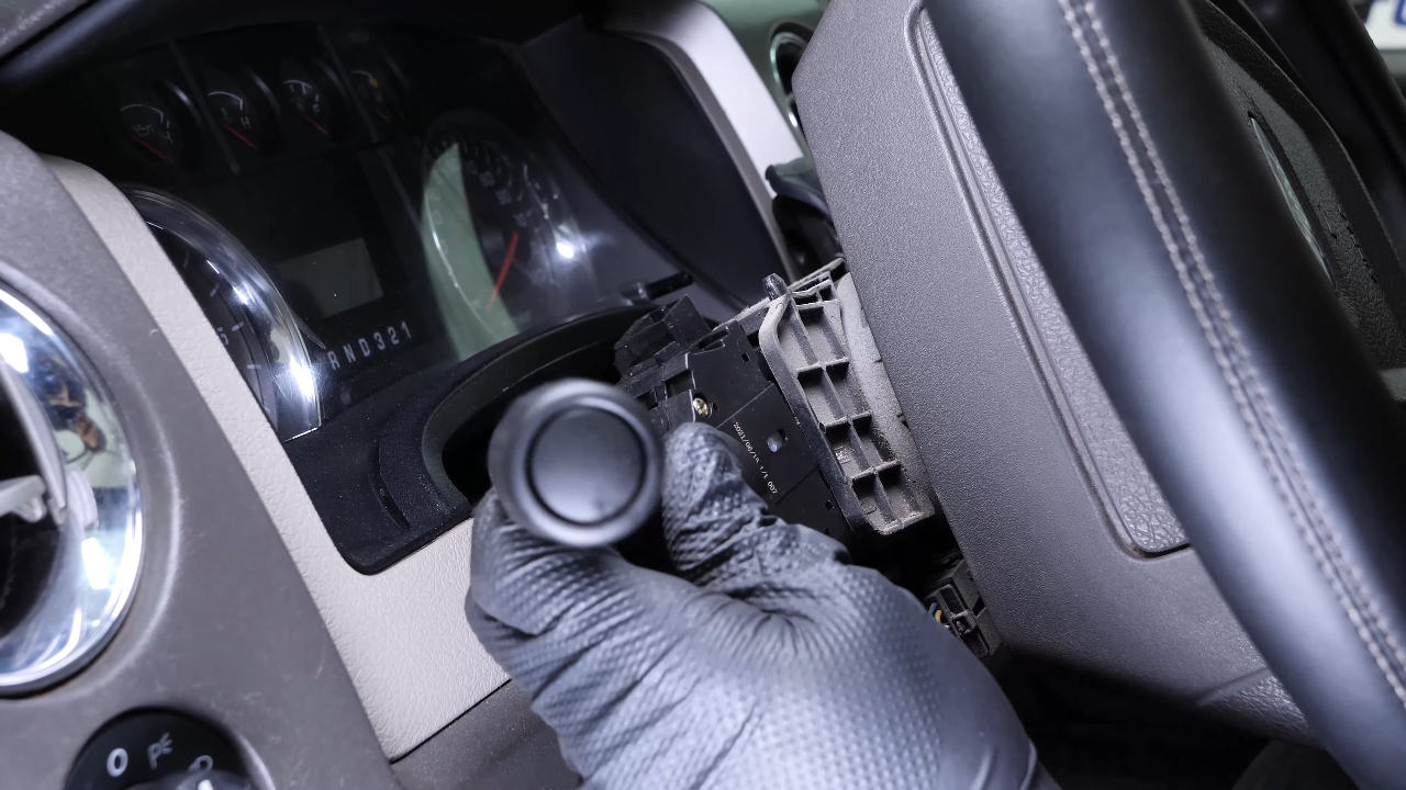 Put the turn signal switch back