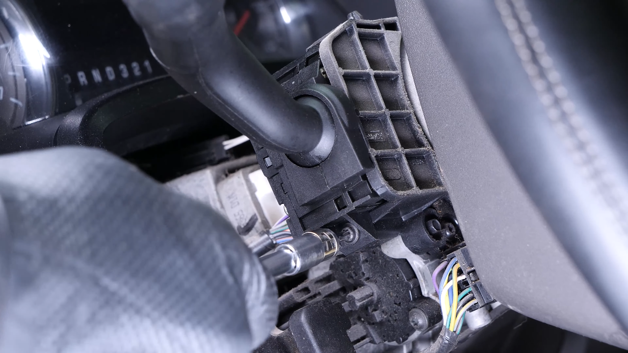 Put the turn signal switch back