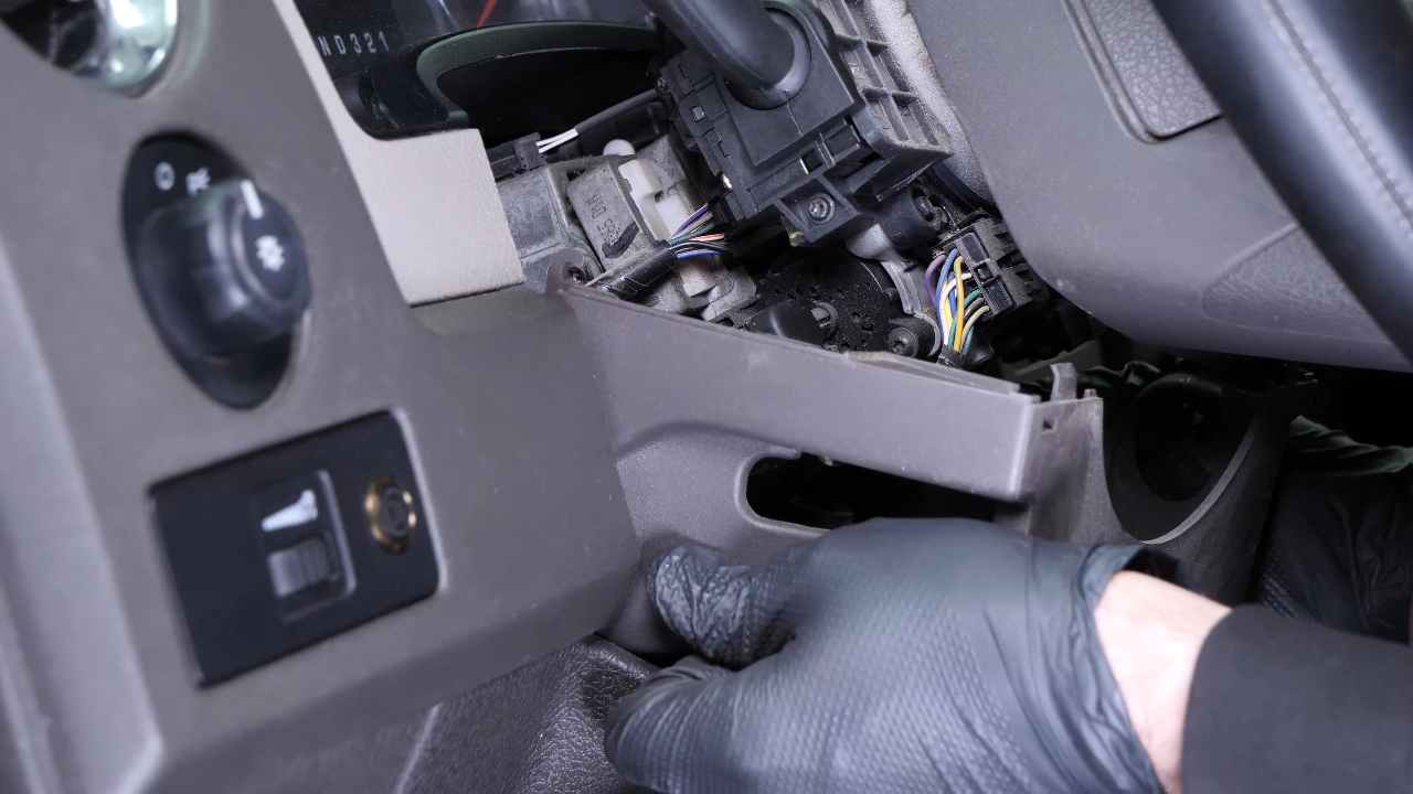 Put the lower steering column cover back
