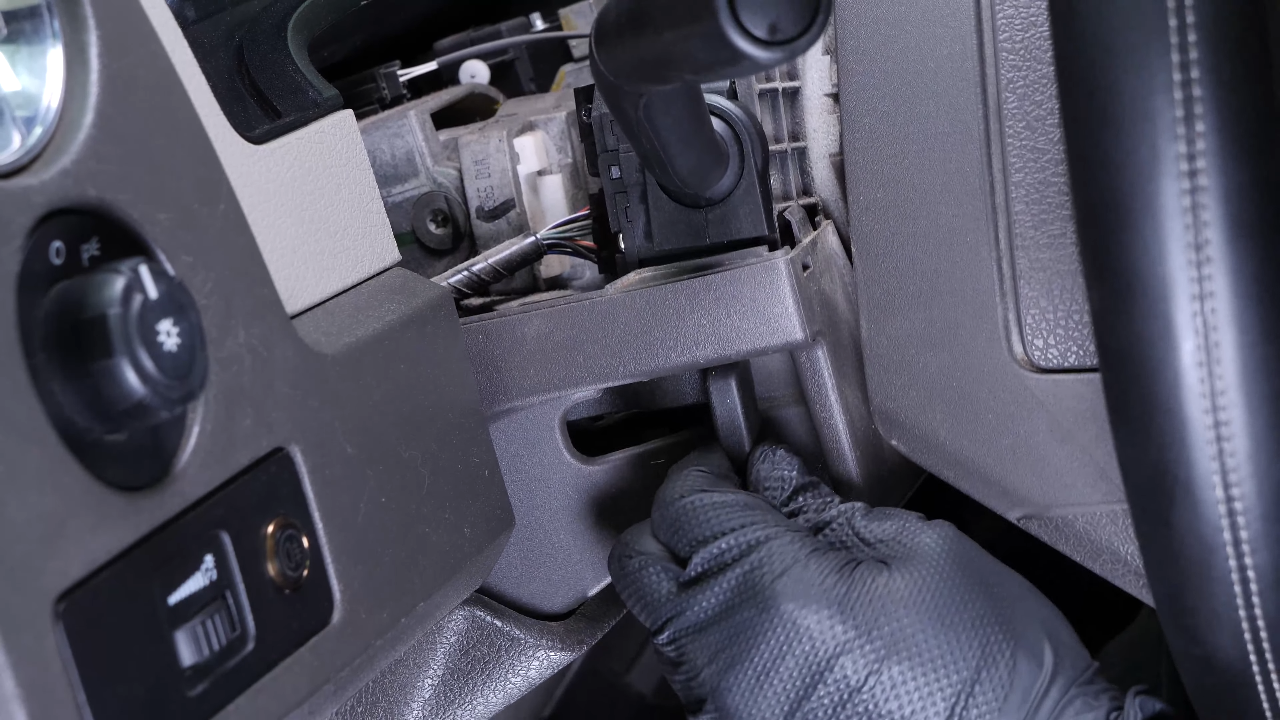 Put the lower steering column cover back